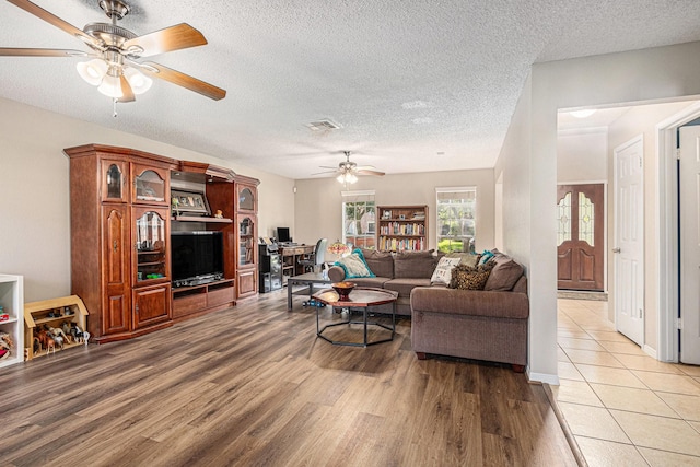 1826 Concho River Ct, Sugar Land, TX 77478 - living area with ceiling fan, wood finished floors, a textured ceiling, and a desk