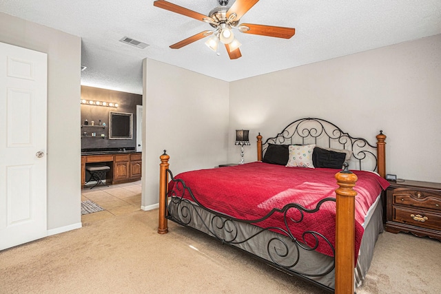 1826 Concho River Ct, Sugar Land, TX 77478 - bedroom with light carpet, connected bathroom, ceiling fan, and baseboards