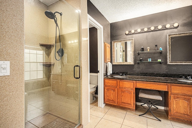 1826 Concho River Ct, Sugar Land, TX 77478 - bathroom with toilet, a stall shower, and tile patterned floors