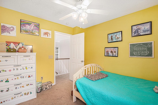 1826 Concho River Ct, Sugar Land, TX 77478 - carpeted bedroom featuring ceiling fan and a textured ceiling