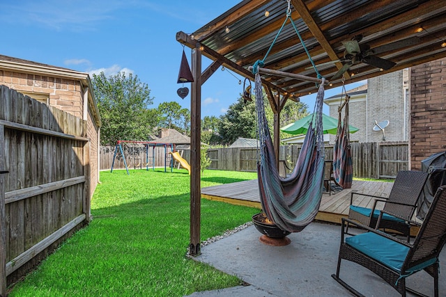 1826 Concho River Ct, Sugar Land, TX 77478 - view of yard featuring a playground, a wooden deck, a patio area, and ceiling fan