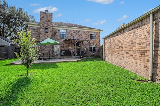 1826 Concho River Ct, Sugar Land, TX 77478 - back of house with brick siding and a chimney
