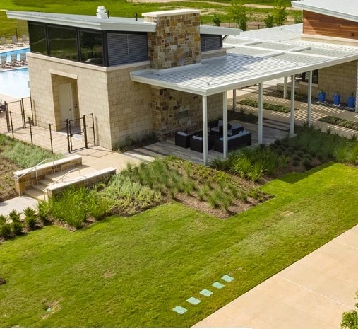 31726 Autumn Spur Ln, Hockley, TX 77447 - exterior space with a patio area, an outdoor pool, and a chimney