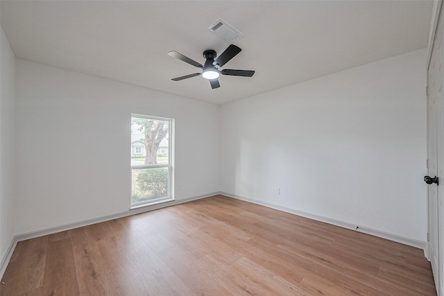 6023 Viking Dr, Houston, TX 77092 - spare room with light wood-style flooring, a ceiling fan, and baseboards