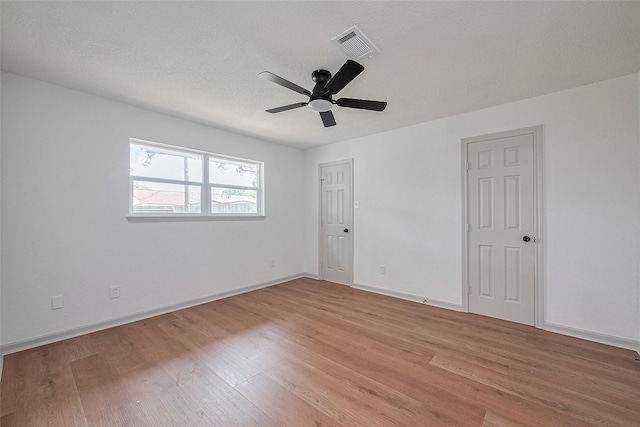 6023 Viking Dr, Houston, TX 77092 - spare room with light wood-style floors, ceiling fan, and baseboards