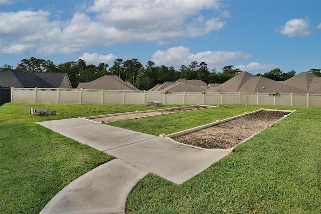 5746 Lakeside Villas Ct, Conroe, TX 77304 - view of yard with a vegetable garden