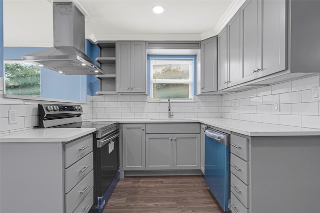 2406 W Elvinta St, Baytown, TX 77520 - kitchen featuring stainless steel electric stove, island exhaust hood, dishwashing machine, gray cabinets, and recessed lighting