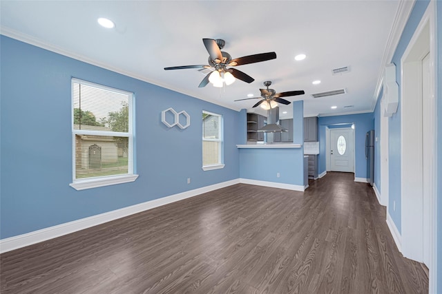 2406 W Elvinta St, Baytown, TX 77520 - unfurnished living room with crown molding, a ceiling fan, dark wood finished floors, baseboards, and recessed lighting