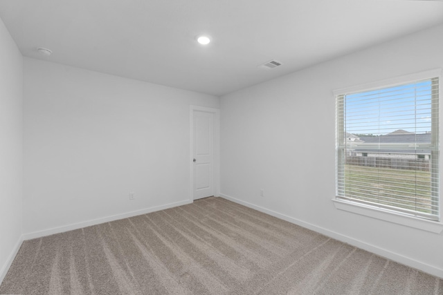 19380 Poppy Village Cir, Magnolia, TX 77355 - empty room with carpet flooring, baseboards, a smoke detector, and recessed lighting