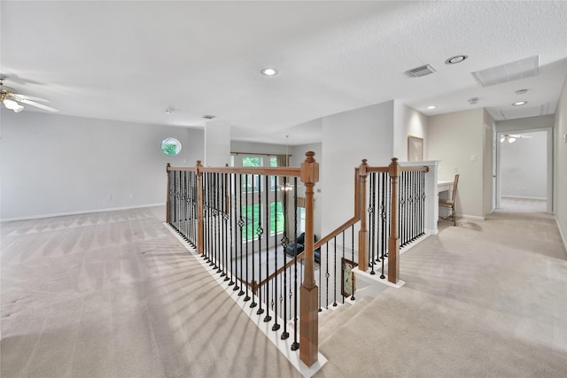 14414 Spanish River Ln, Cypress, TX 77429 - hallway with carpet floors, an upstairs landing, baseboards, and recessed lighting