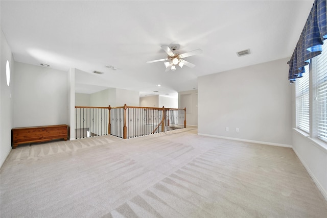 14414 Spanish River Ln, Cypress, TX 77429 - unfurnished room featuring light colored carpet, ceiling fan, and baseboards