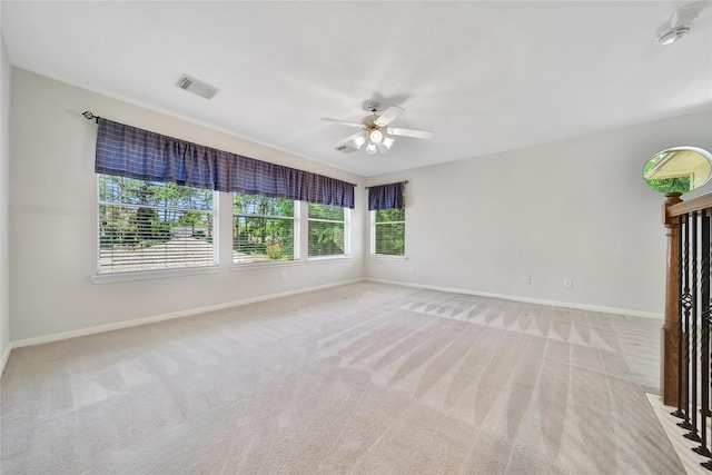 14414 Spanish River Ln, Cypress, TX 77429 - unfurnished room featuring a ceiling fan, baseboards, and light carpet