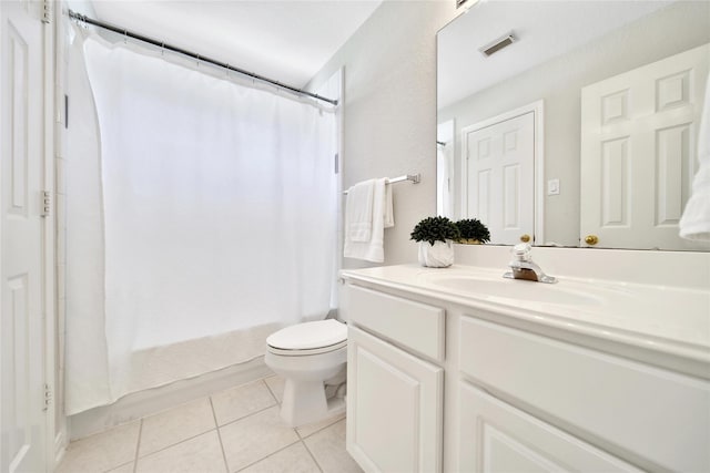 14414 Spanish River Ln, Cypress, TX 77429 - full bathroom with vanity, tile patterned flooring, shower / bath combo with shower curtain, and toilet