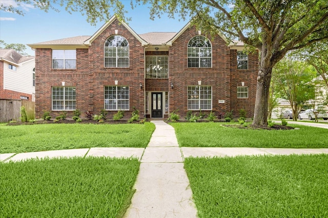 13411 SE Via Chianti Ln, Cypress, TX 77429 - traditional-style house featuring brick siding