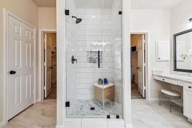 13411 SE Via Chianti Ln, Cypress, TX 77429 - full bathroom with marble finish flooring, a walk in closet, a stall shower, and vanity