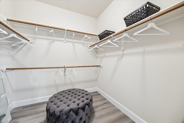 13411 SE Via Chianti Ln, Cypress, TX 77429 - spacious closet featuring wood finished floors