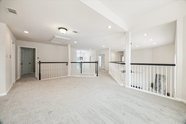 13411 SE Via Chianti Ln, Cypress, TX 77429 - spare room with attic access, light carpet, recessed lighting, and baseboards