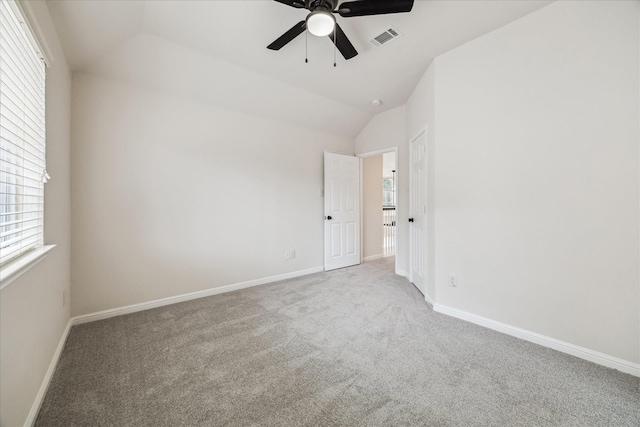 13411 SE Via Chianti Ln, Cypress, TX 77429 - unfurnished bedroom with carpet floors, lofted ceiling, baseboards, and ceiling fan
