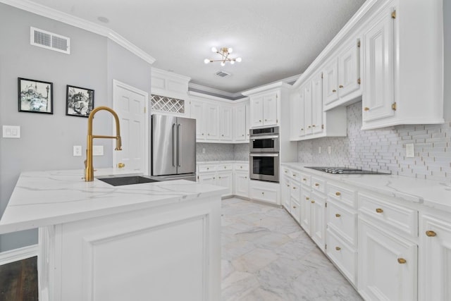1806 Quiet Country Ct, Houston, TX 77345 - kitchen with stainless steel appliances, light marble finish floors, tasteful backsplash, a sink, and a kitchen island with sink