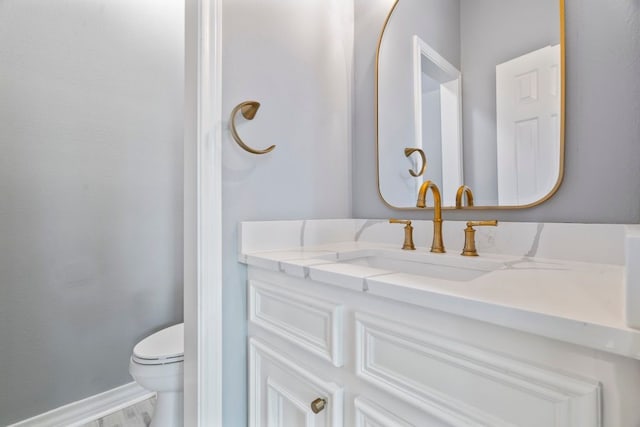 1806 Quiet Country Ct, Houston, TX 77345 - bathroom with vanity, toilet, and baseboards