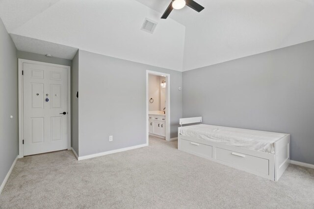 1806 Quiet Country Ct, Houston, TX 77345 - unfurnished bedroom with light colored carpet, vaulted ceiling, baseboards, connected bathroom, and a ceiling fan