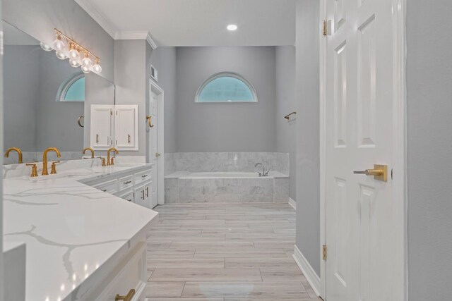 1806 Quiet Country Ct, Houston, TX 77345 - full bathroom featuring a bath, double vanity, wood finished floors, and recessed lighting