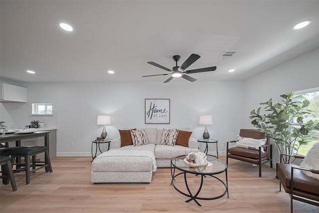 7406 Valeda Dr, Deer Park, TX 77536 - living area with light wood-type flooring, baseboards, recessed lighting, and a ceiling fan