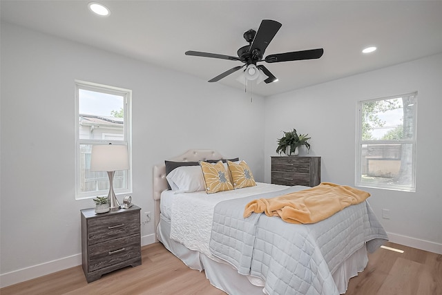 7406 Valeda Dr, Deer Park, TX 77536 - bedroom featuring light wood finished floors, baseboards, recessed lighting, and ceiling fan