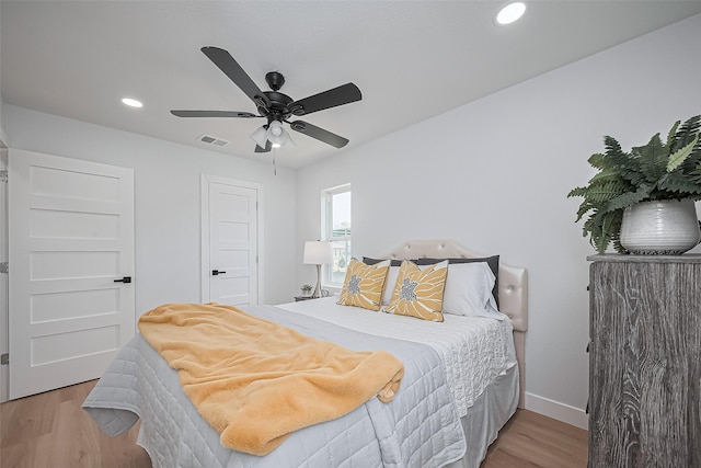 7406 Valeda Dr, Deer Park, TX 77536 - bedroom with light wood finished floors, baseboards, recessed lighting, and ceiling fan