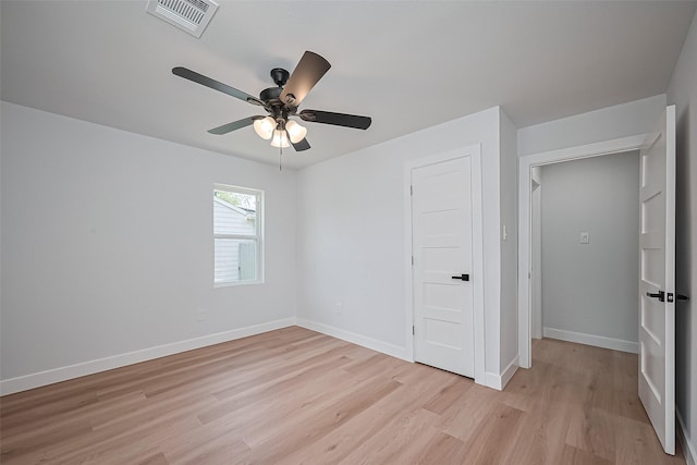 7406 Valeda Dr, Deer Park, TX 77536 - unfurnished bedroom with light wood-style floors, baseboards, and a ceiling fan