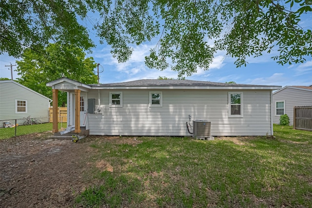 7406 Valeda Dr, Deer Park, TX 77536 - rear view of property featuring central AC unit and entry steps