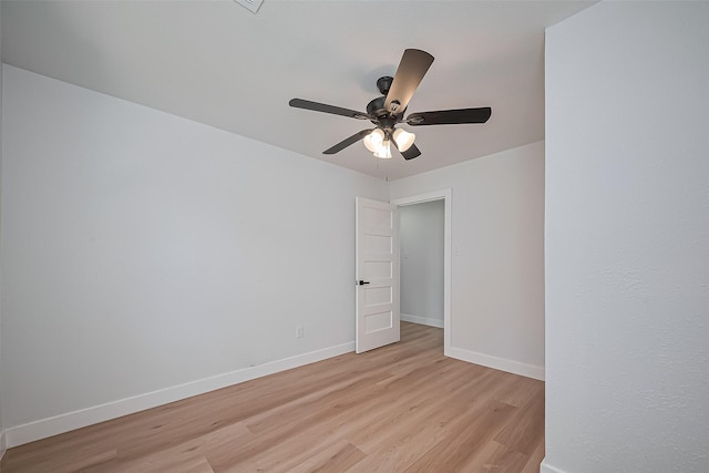 7406 Valeda Dr, Deer Park, TX 77536 - spare room featuring light wood finished floors, baseboards, and a ceiling fan