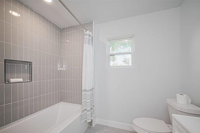 7406 Valeda Dr, Deer Park, TX 77536 - bathroom with toilet, tile patterned floors, vanity, shower / bath combo, and baseboards
