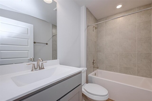 2214 Salton Sea Ln, Texas City, TX 77568 - bathroom featuring toilet, vanity, and shower / bathtub combination
