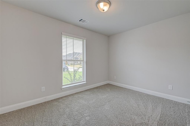 2214 Salton Sea Ln, Texas City, TX 77568 - carpeted spare room featuring healthy amount of natural light and baseboards