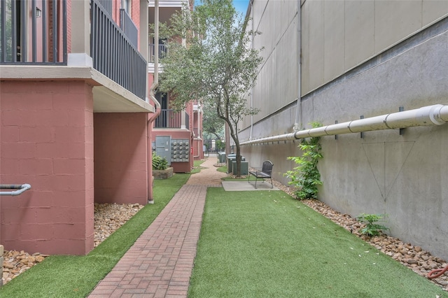 2400 Mccue Rd Unit 250, Houston, TX 77056 - view of grassy yard with central AC unit