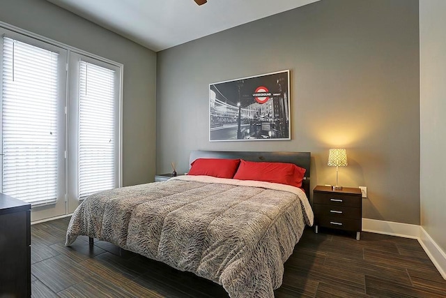 2400 Mccue Rd Unit 250, Houston, TX 77056 - bedroom with baseboards and wood finished floors