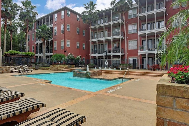 2400 Mccue Rd Unit 250, Houston, TX 77056 - view of pool featuring a patio and a pool with connected hot tub