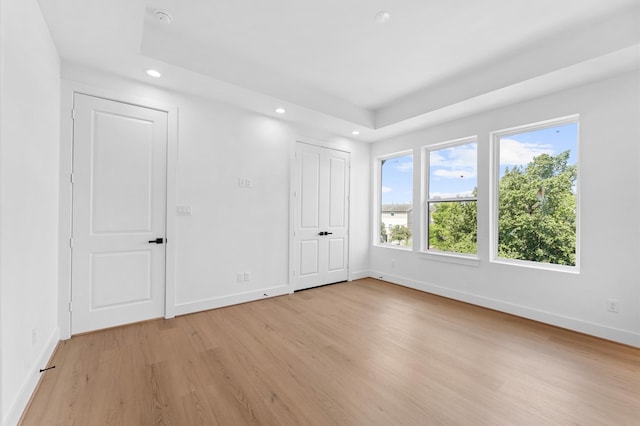 3209 Baer St Unit B, Houston, TX 77020 - unfurnished bedroom with light wood finished floors and recessed lighting