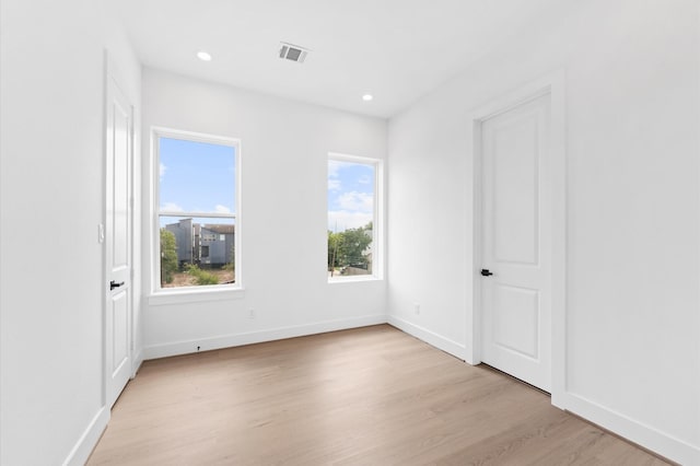 3209 Baer St Unit B, Houston, TX 77020 - spare room with light wood-style floors and recessed lighting