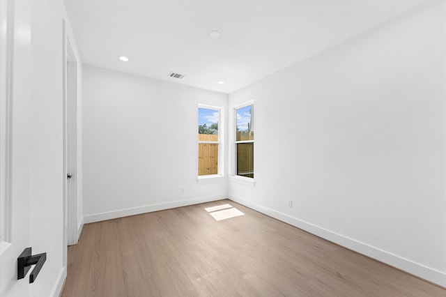 3209 Baer St Unit B, Houston, TX 77020 - spare room with light wood-style floors and recessed lighting
