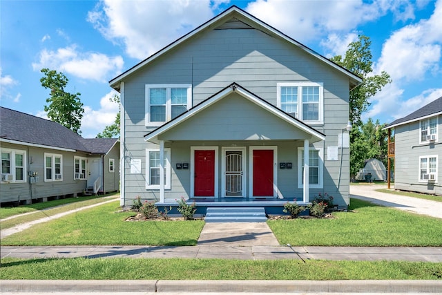 214 W Republic St Unit 10, Baytown, TX 77520 - view of front of property with a porch and a front lawn