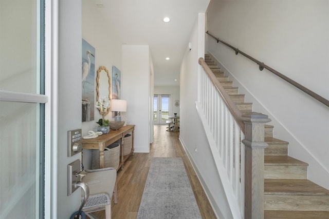 3903 Evening Primrose Dr, Galveston, TX 77554 - foyer with stairs, wood finished floors, and recessed lighting