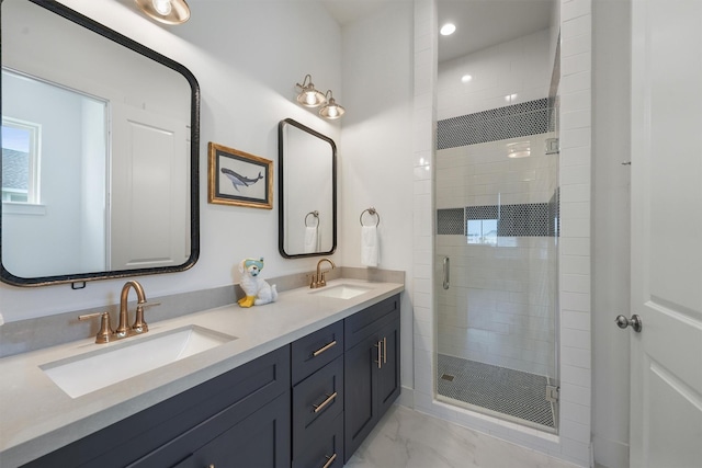 3903 Evening Primrose Dr, Galveston, TX 77554 - bathroom with marble finish flooring, double vanity, a shower stall, and recessed lighting
