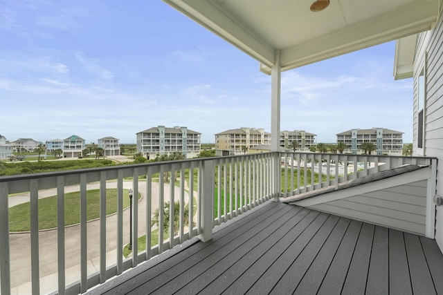 3903 Evening Primrose Dr, Galveston, TX 77554 - wooden terrace featuring a residential view