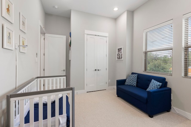 1703 Freeman St, Houston, TX 77009 - carpeted bedroom featuring baseboards and a closet