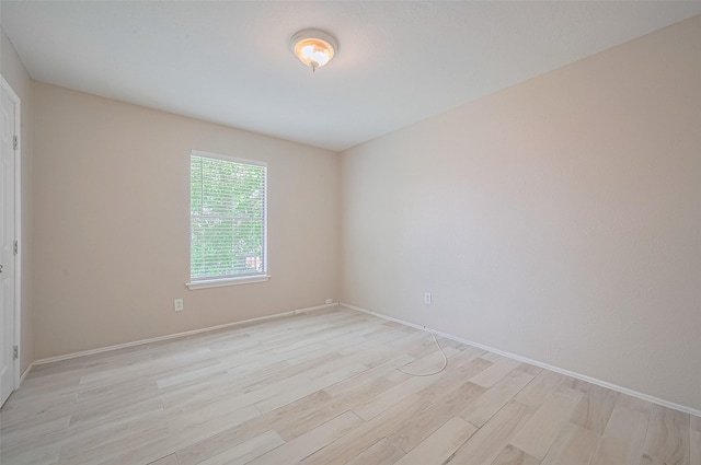 16502 N Glade Dr, Houston, TX 77073 - empty room featuring light wood-type flooring and baseboards