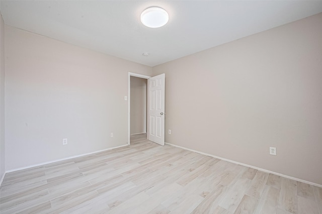 16502 N Glade Dr, Houston, TX 77073 - empty room featuring light wood-style floors and baseboards