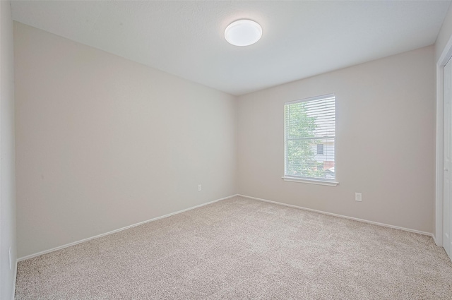 16502 N Glade Dr, Houston, TX 77073 - empty room with carpet and baseboards