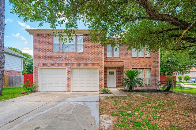 16502 N Glade Dr, Houston, TX 77073 - view of front of property with concrete driveway, an attached garage, and brick siding